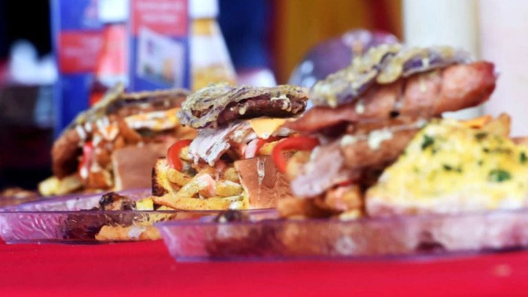 Jozi Kota Festival: Locals Brave Wet Weather for Township Culinary Delights in Newtown