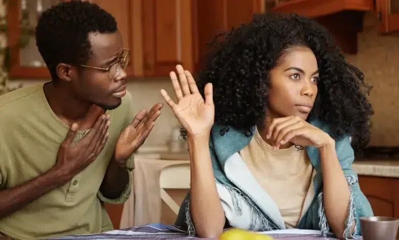 Please forgive me. Unhappy African American male cheater holding hand on chest